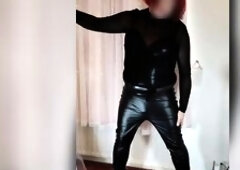 Lewd tv whore Nottstvslut in leather panties and sheer top.